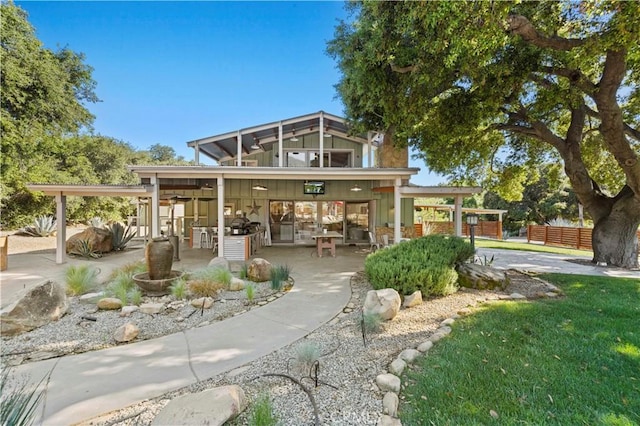 12475 Christmas Tree Rd, Ojai, CA 93023 - rear view of house featuring board and batten siding and fence