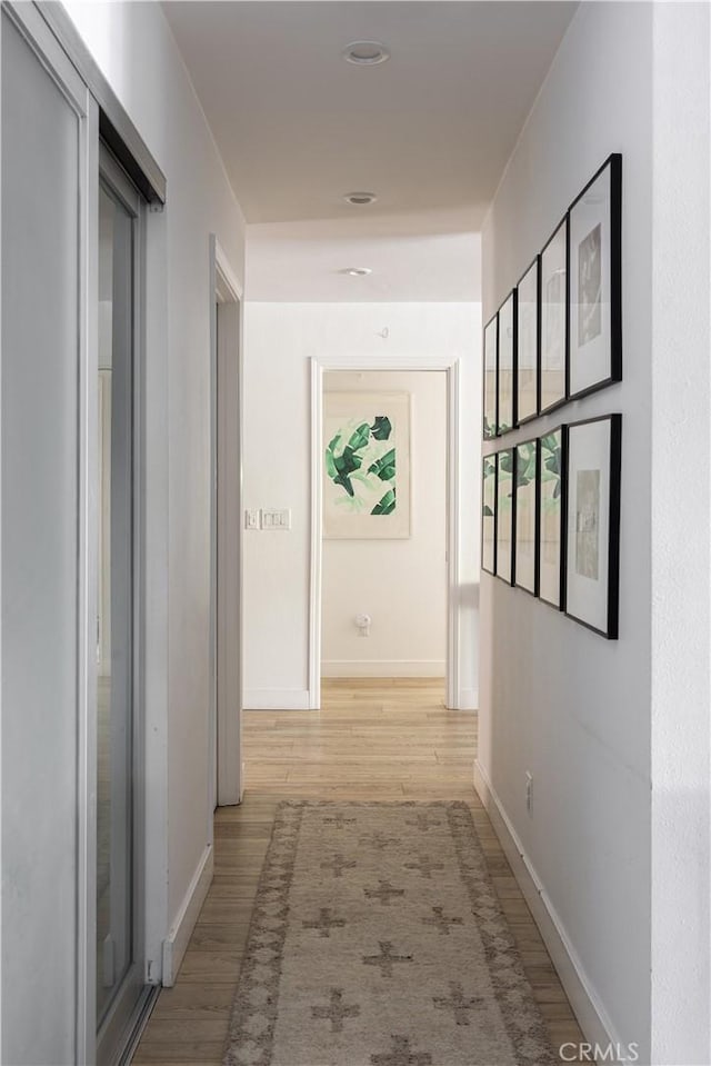 hall featuring light hardwood / wood-style flooring