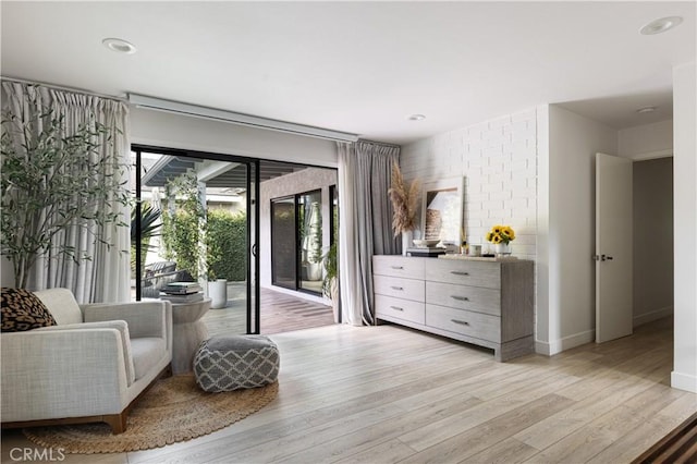 living area featuring light hardwood / wood-style flooring