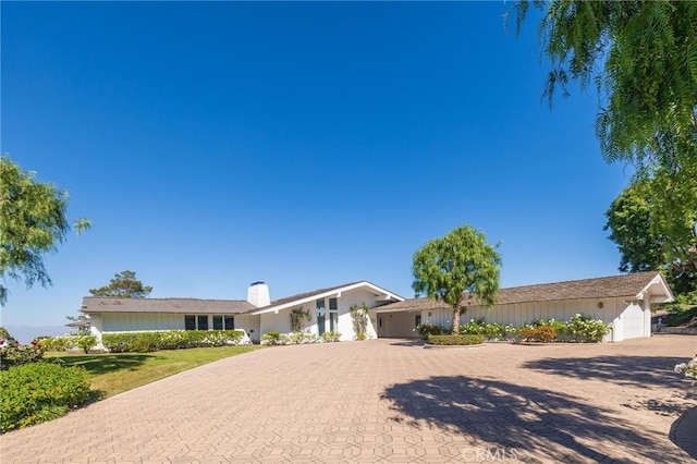 ranch-style home with a garage