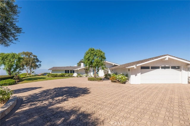 ranch-style home with a garage