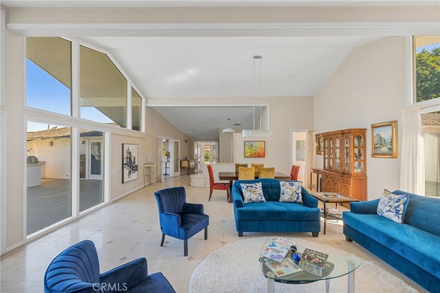 tiled living room with high vaulted ceiling