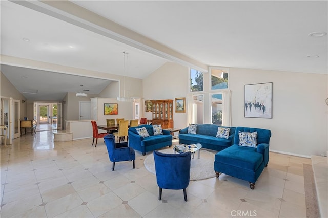 living room featuring french doors and lofted ceiling with beams