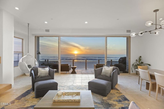 living room featuring a water view