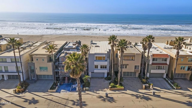 aerial view featuring a beach view and a water view
