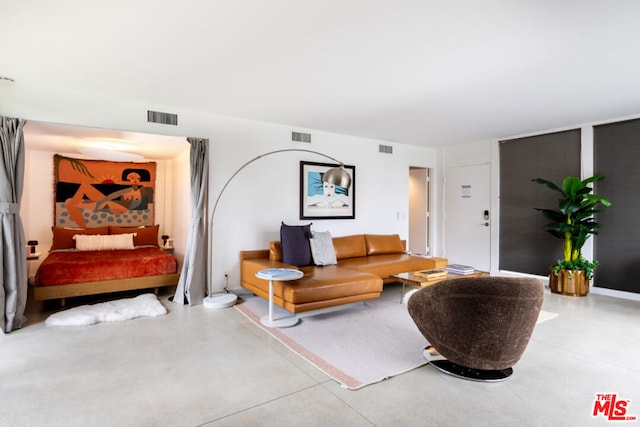 living room with concrete floors