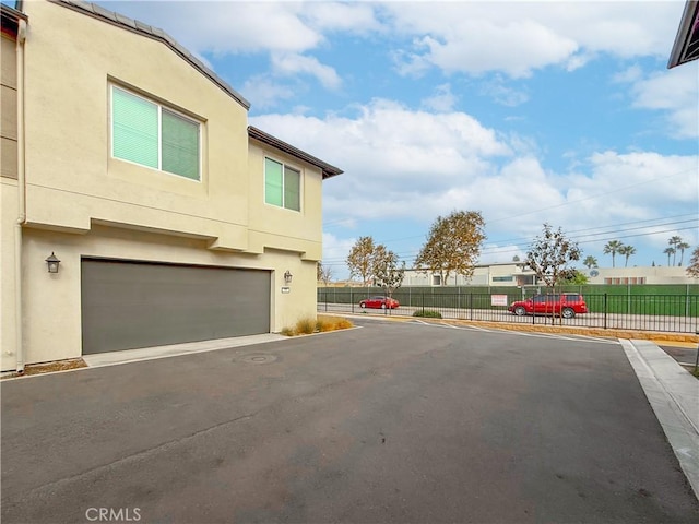 view of home's exterior with a garage