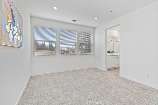 view of carpeted spare room