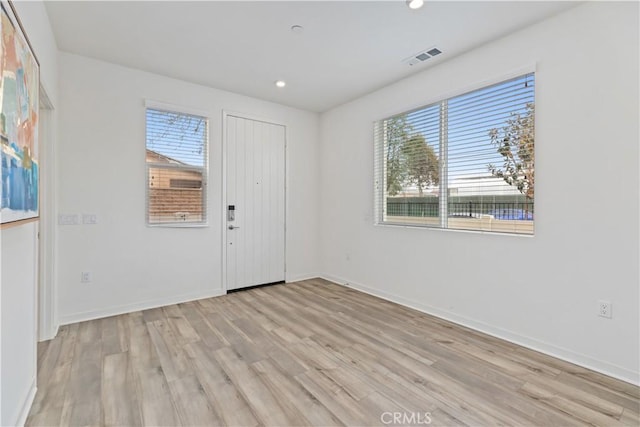 entrance foyer featuring light hardwood / wood-style flooring