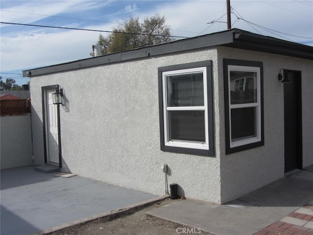 view of home's exterior featuring a patio