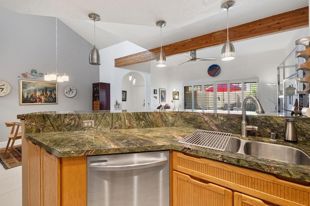 kitchen with ceiling fan, stainless steel dishwasher, vaulted ceiling with beams, sink, and hanging light fixtures