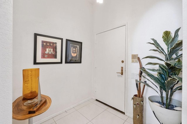 view of tiled foyer entrance