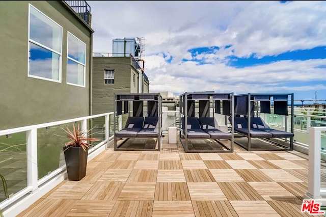 view of patio / terrace with a balcony