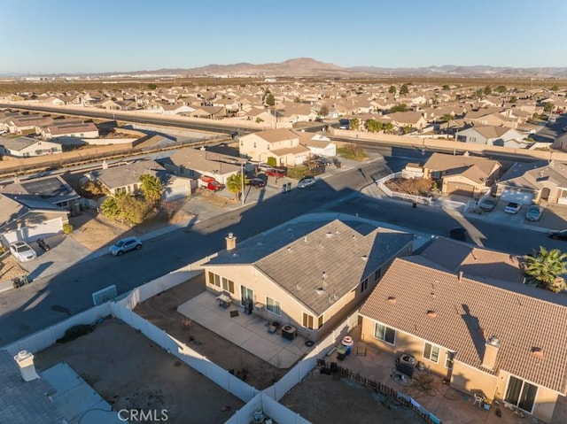 drone / aerial view featuring a mountain view