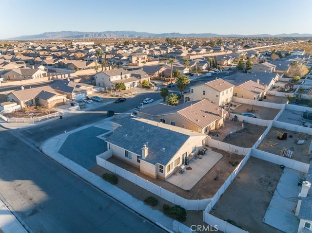 drone / aerial view featuring a mountain view