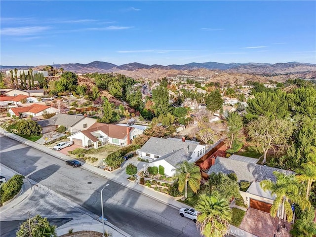 drone / aerial view featuring a mountain view