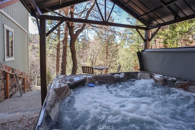 view of patio featuring a hot tub