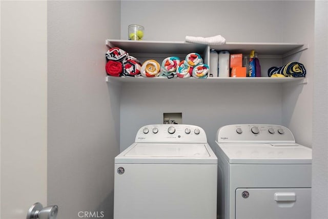 washroom with separate washer and dryer