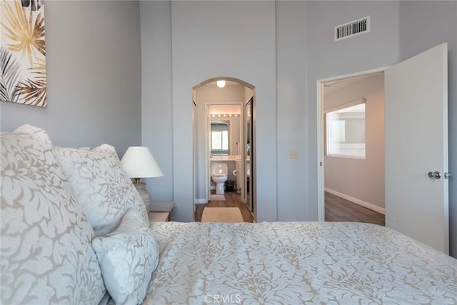 bedroom featuring connected bathroom