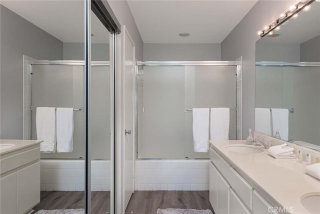 bathroom featuring vanity and wood-type flooring