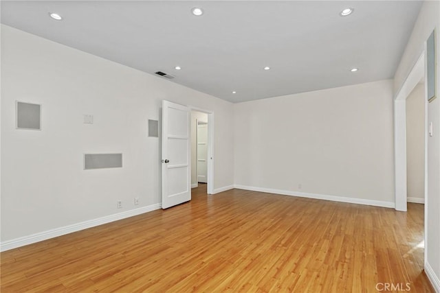 unfurnished bedroom featuring light wood-type flooring