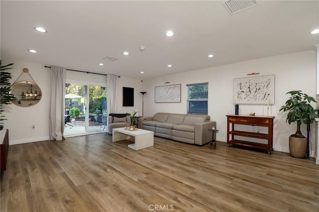 living room with wood-type flooring