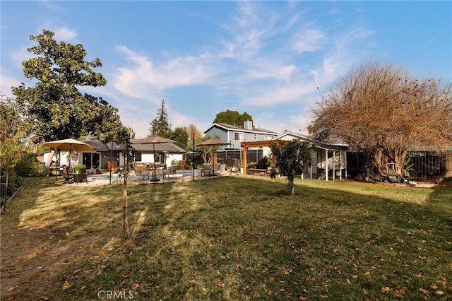 view of yard with a pergola, a patio area, and a gazebo