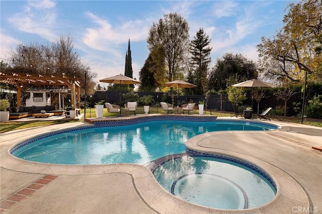 view of swimming pool featuring a pergola, a patio area, and an in ground hot tub