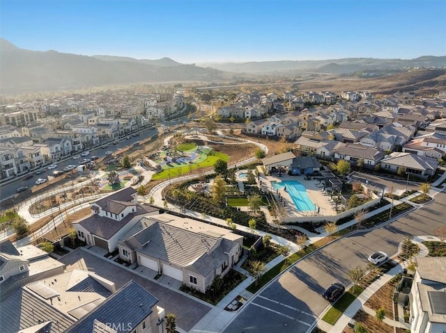 drone / aerial view featuring a mountain view