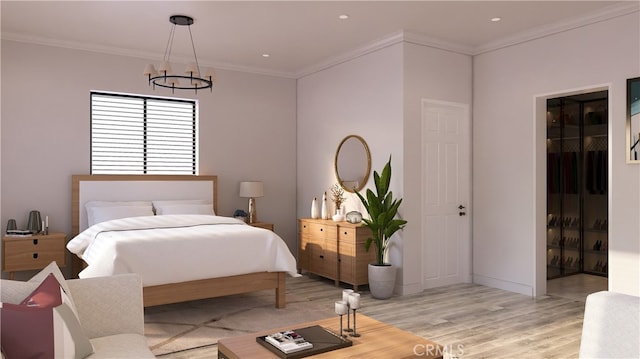 bedroom with ornamental molding, light hardwood / wood-style floors, and a notable chandelier