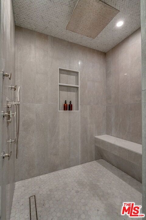 bathroom featuring walk in shower