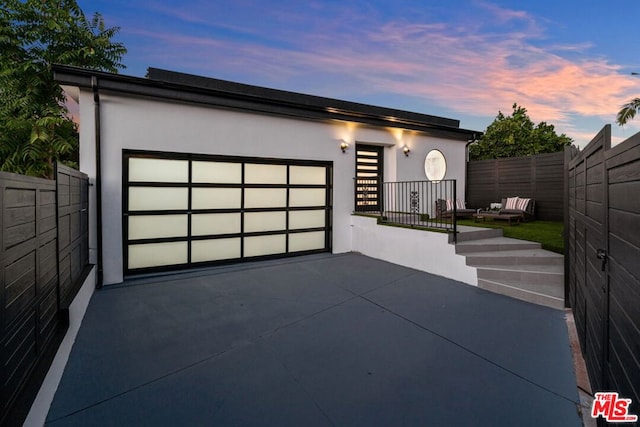 view of front of house with a garage