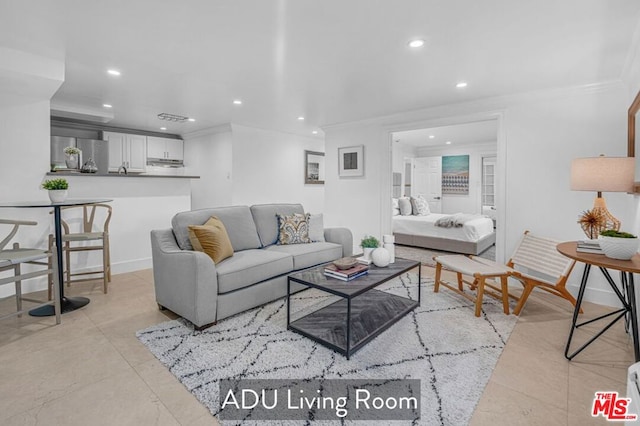 living room with crown molding