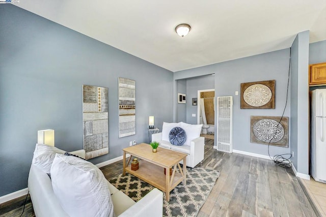 living room with hardwood / wood-style floors