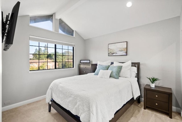 bedroom featuring light colored carpet and lofted ceiling with beams