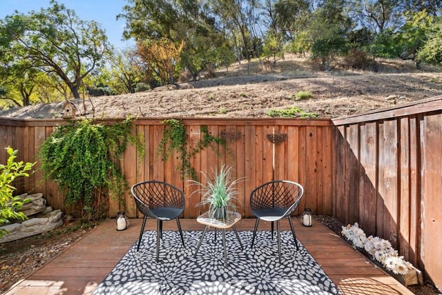 view of patio / terrace featuring a wooden deck