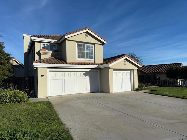 view of home's exterior featuring a garage and a yard