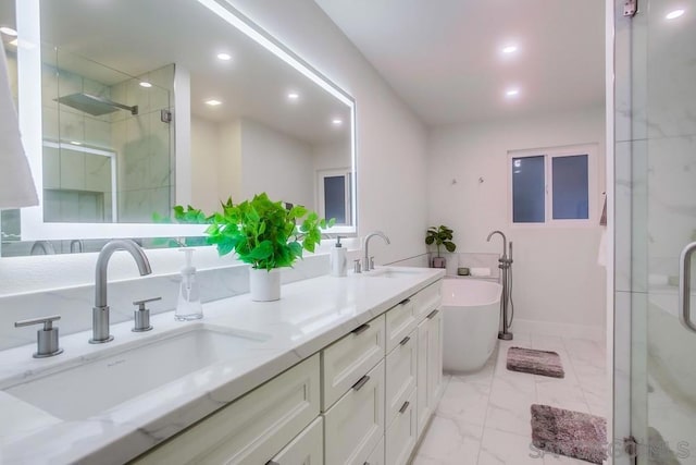 bathroom featuring shower with separate bathtub and vanity