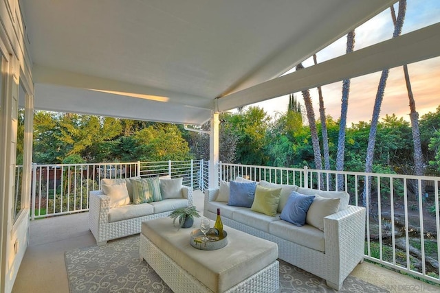 exterior space with an outdoor living space and a balcony