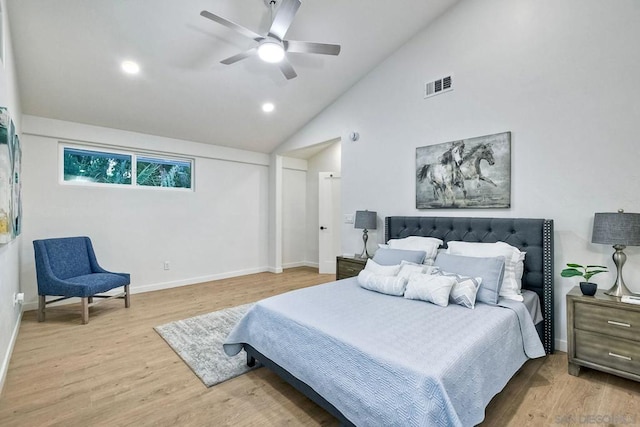 bedroom featuring ceiling fan, high vaulted ceiling, and hardwood / wood-style floors