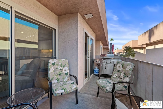 balcony featuring area for grilling