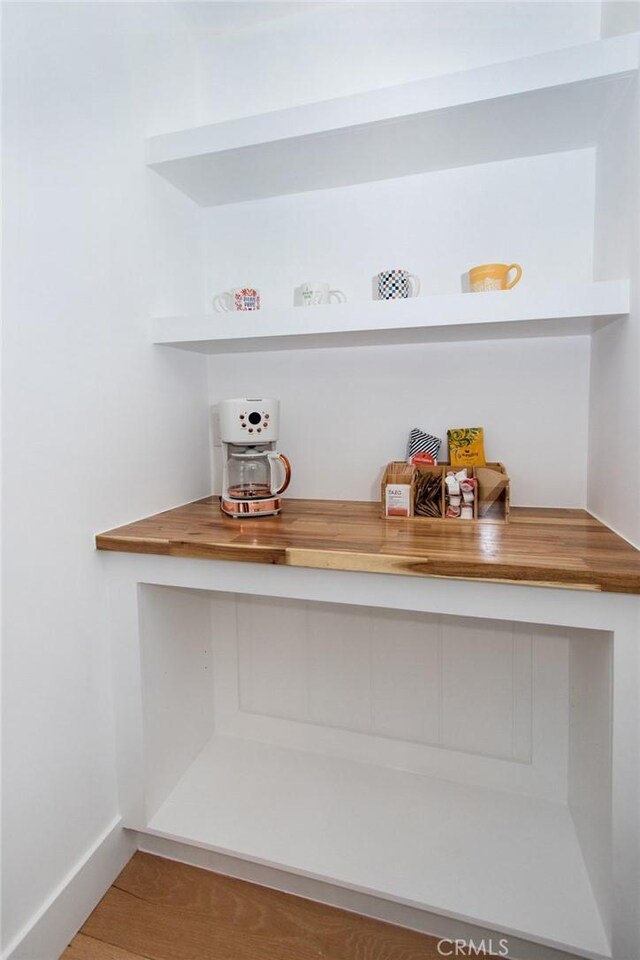 bar featuring butcher block counters