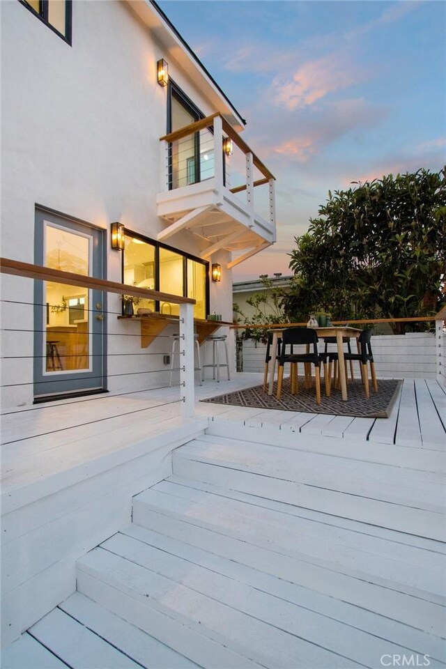 view of deck at dusk