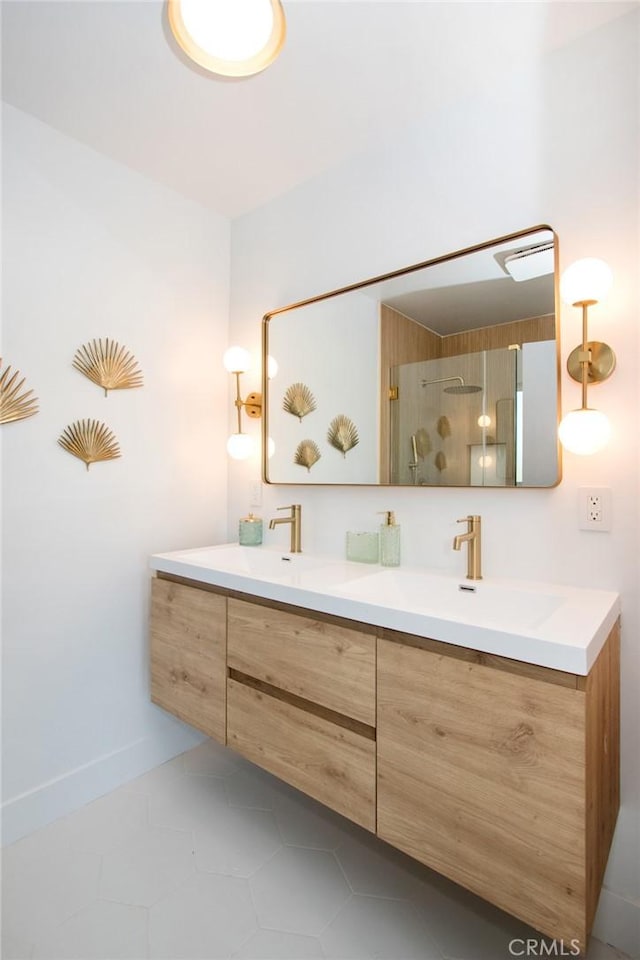 bathroom featuring vanity, tile patterned floors, and a shower with door