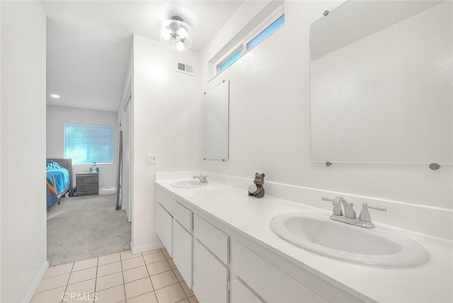 bathroom featuring vanity and tile patterned flooring