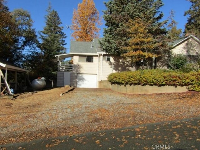 exterior space featuring a garage