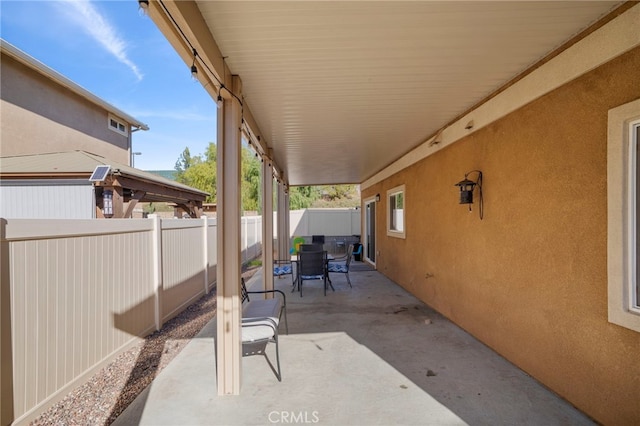 view of patio / terrace with outdoor dining area and a fenced backyard