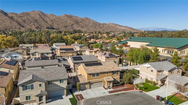 birds eye view of property featuring a residential view and a mountain view