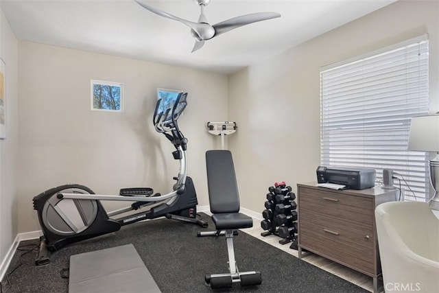 workout area with ceiling fan