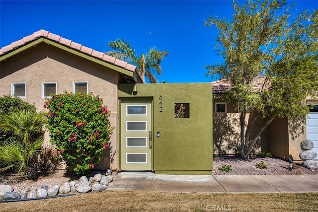 exterior space featuring stucco siding